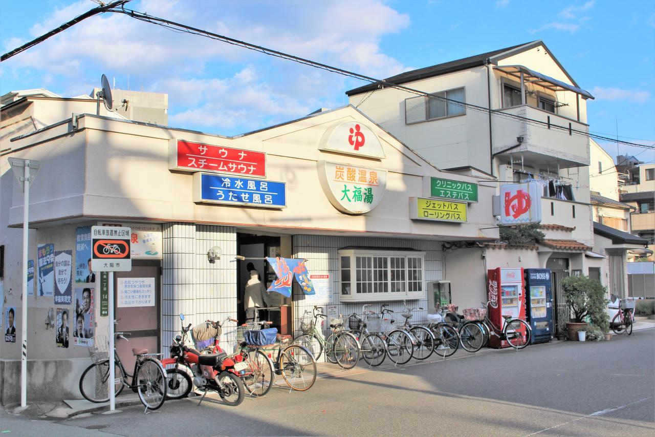Sekai Hotel Mangetsu Osaka Bagian luar foto